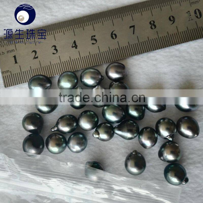 high luster AA peacock green baroque south sea pearl tahitian