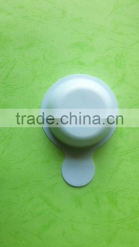 white disposable plastic tray for urine testing.