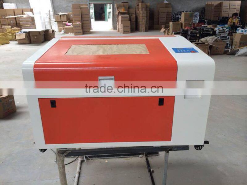 50W/60W optional LY CO2 laser wood engraving cutting machine 6040,Manual/Electric Table control mode,Can Applicable Industry