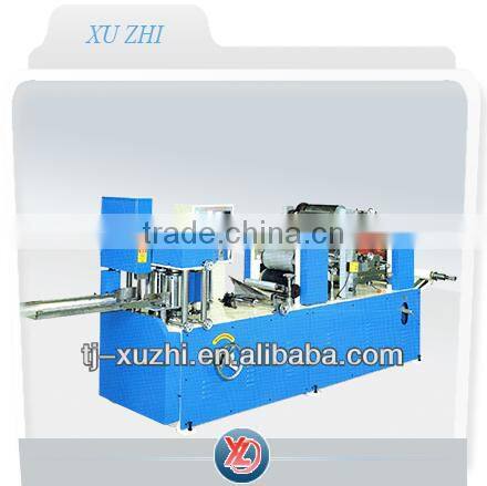 Book fold napkin machine