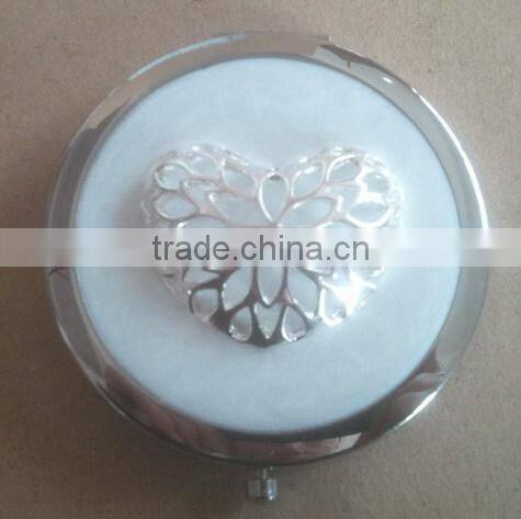 decorative black compact mirror with metal heart decor