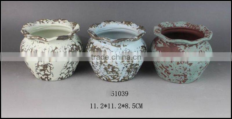 green glazed stoneware flower pot