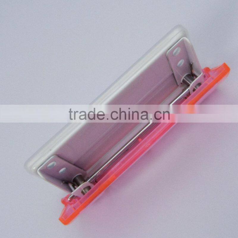 2014 hot selling transparent color plastic 2 hole puncher