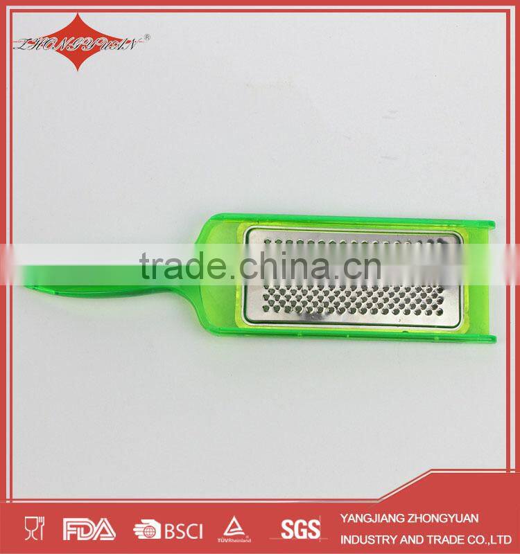 red stainless steel julienne vegetable peeler