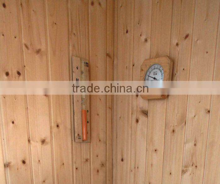 Traditional Sauna room with Sauna stove with digital controller