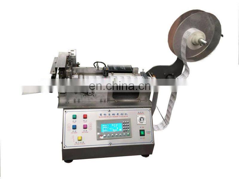 UGS2050 small Automatic table top textile cloth trademark label cutting machine, computerised nylon taffeta tape cutter