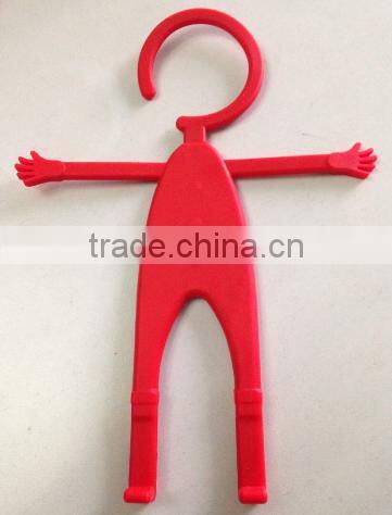 Phone Partner = flexible cell phone holder human hanger design
