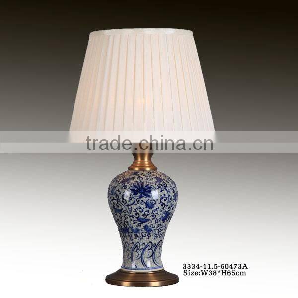 blue and white ceramic lamp with white chiffom shade