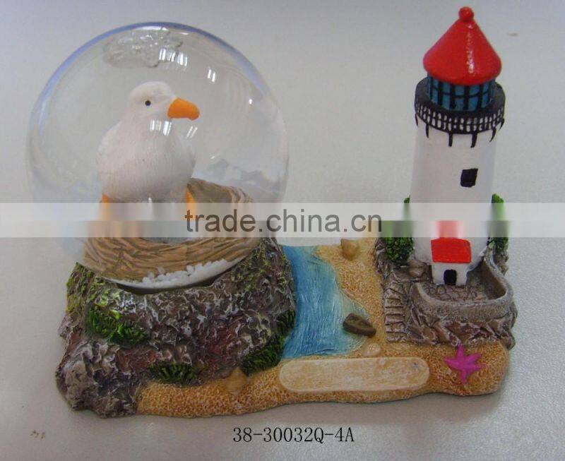 polyresin whale and light house water globe