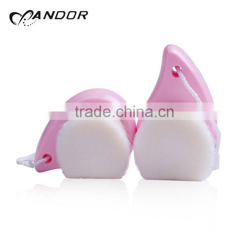 Patent design pink handle andor face cleansing brush