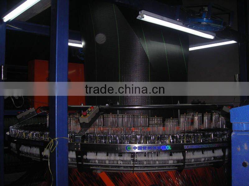 Black plastic ground cover mat