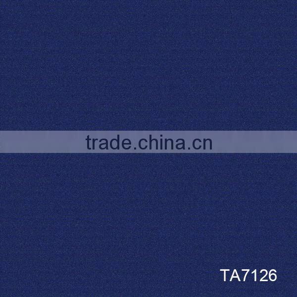 Level loop commercial carpet tile with PVC backing