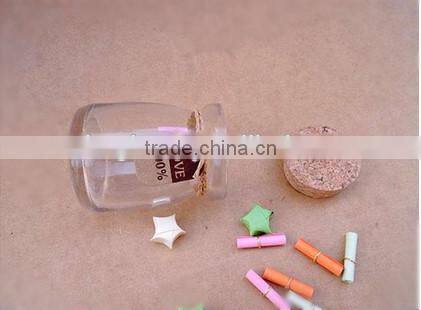 Heart shaped glass bottle with cork