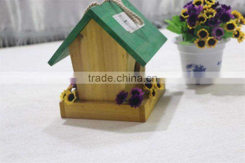 Finished colorful handmade wooden bird nest