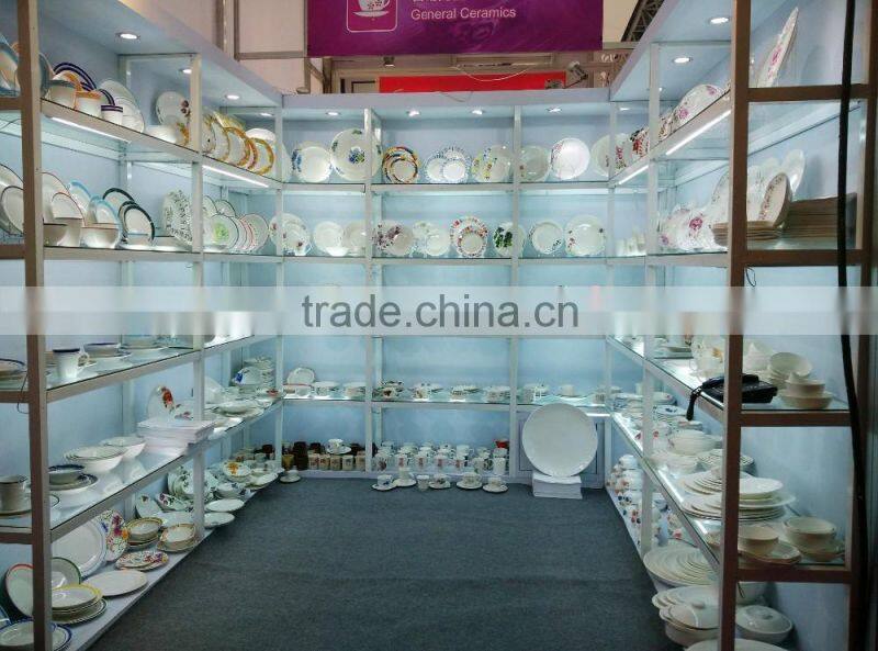 small white porcelain plates with cut edge shape