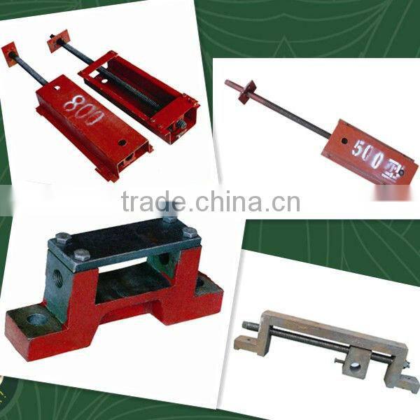 Spiral tensioning device for belt conveyor pulley