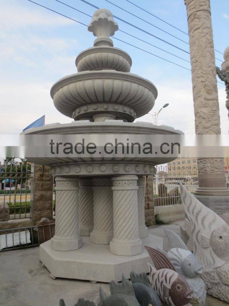dark granite stone fountain garden