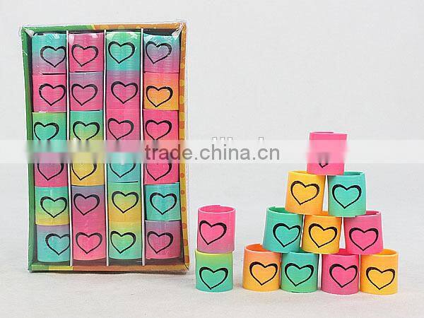 hot sale colorful magic rainbow spring with lovely heart kids educational toys/ plastic rainbow circle
