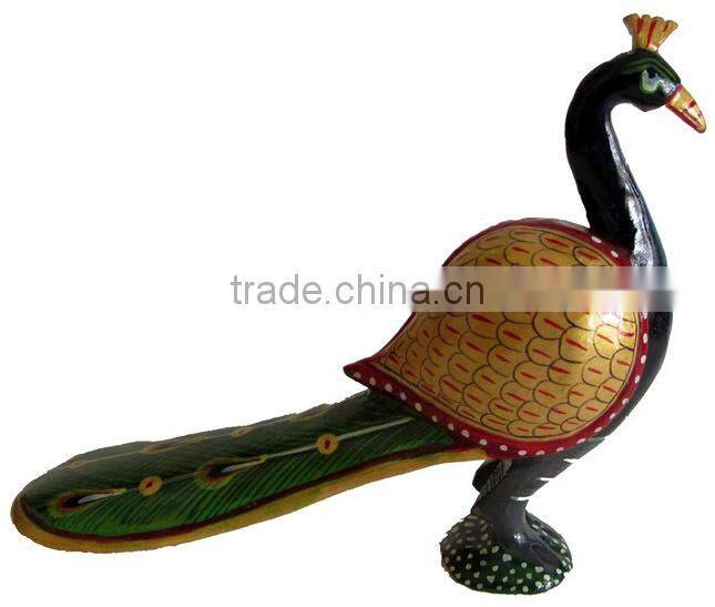 Carved wooden peacock