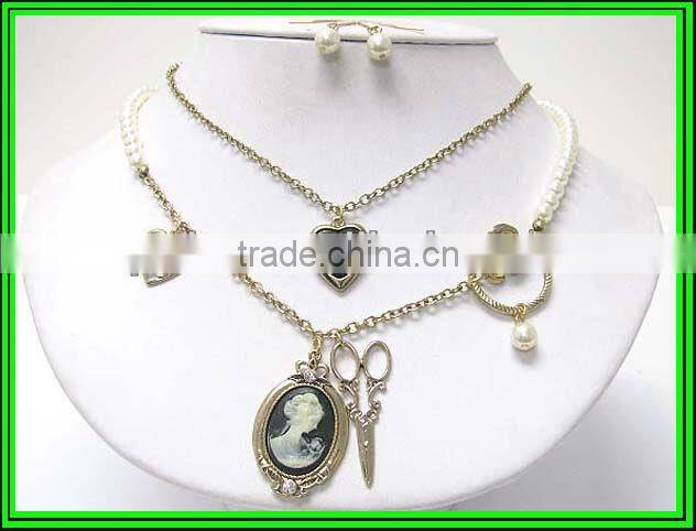 Double layer cameo pendant and scissors and pearl ring dangle necklace earring set