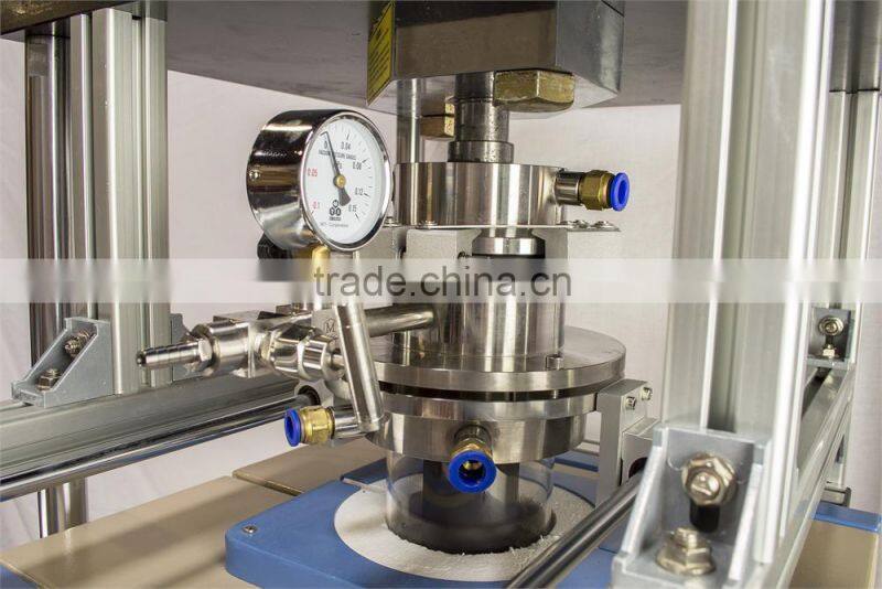 Vacuum heated pressing furnace for making dense compound materials