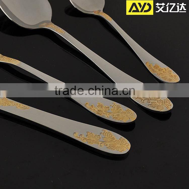 Gold plated flatware with rose design and wooden box