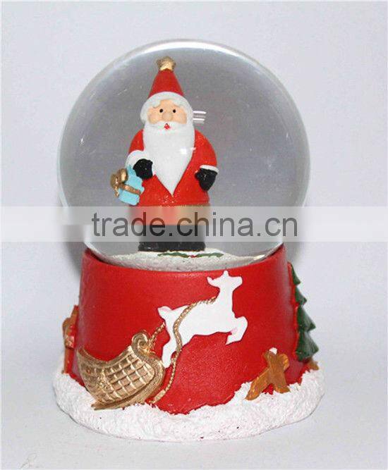 Resin Christmas lighted snow globe