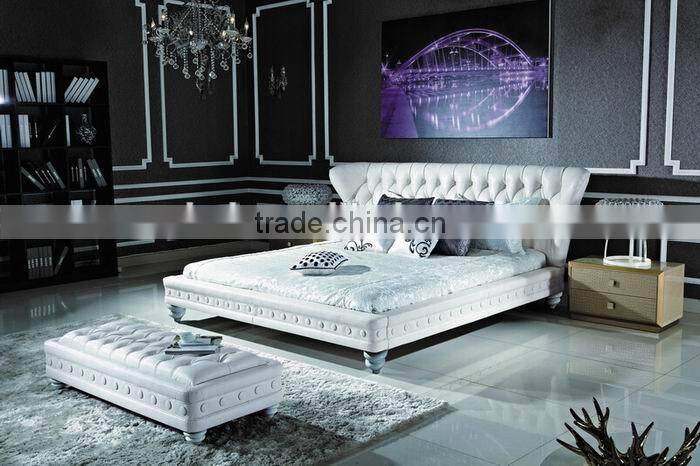 Luxury white leather hotel bed with high headboard