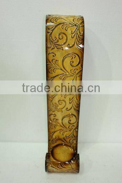 Wall- mounted iron candle holder