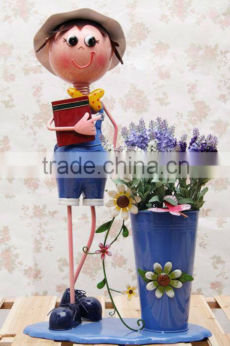 metal doll with flower used for home decor