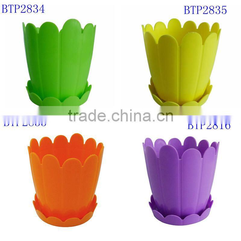 Yellow Plastic fence plant planter with saucer