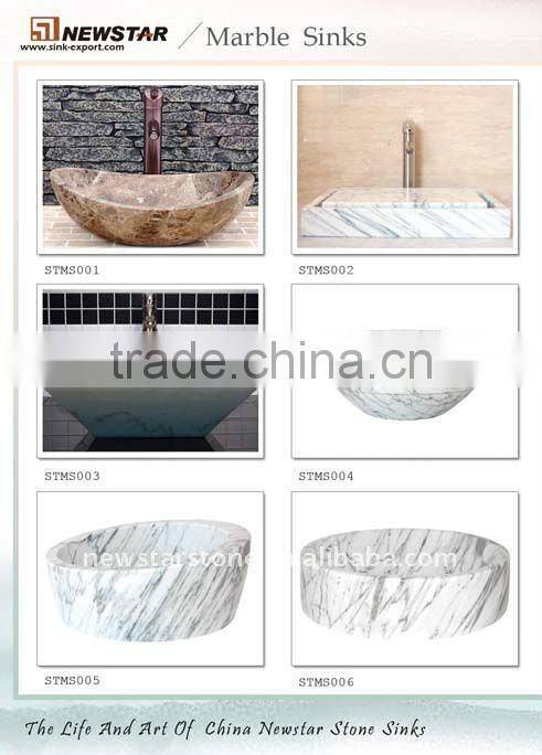 white marble wash basin