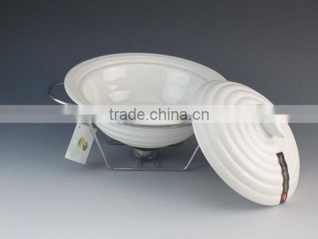 white porcelain casserole with iron rack