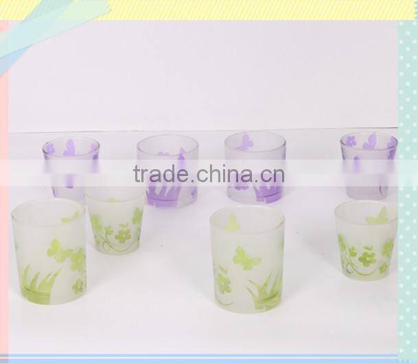 round glass candle holders with spray