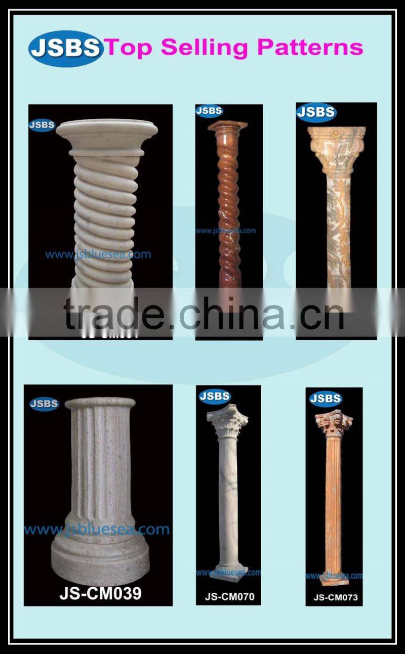 large decorative white stone column caps