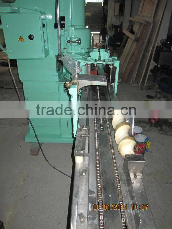 Automatic metal can seaming machine