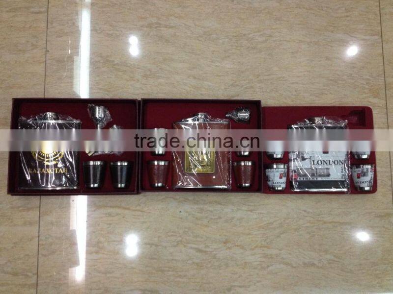 9oz and 18oz hip flask add to four cups and a Funnel in gift set box