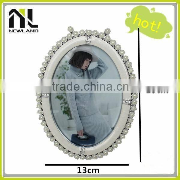 Cheap oval wholesale photo frames picture of baby