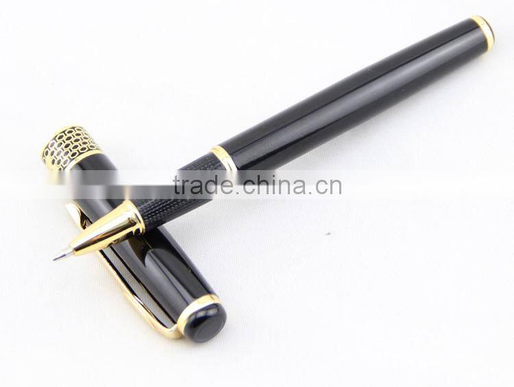 gold plated black ball point pen