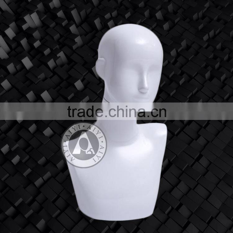 White glossy female mannequin bust without head