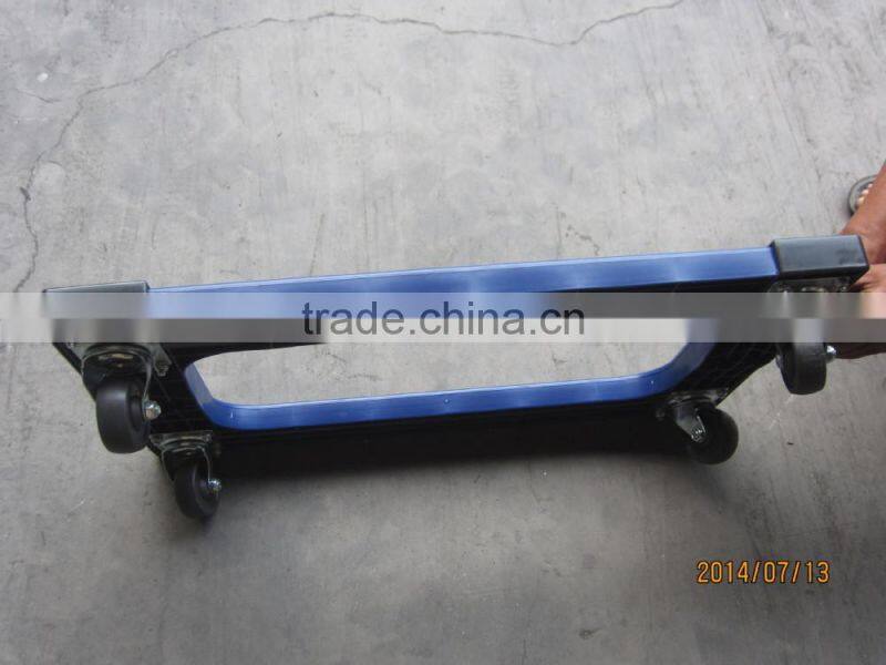 Four-wheel moving pallet dolly with rubber carpet