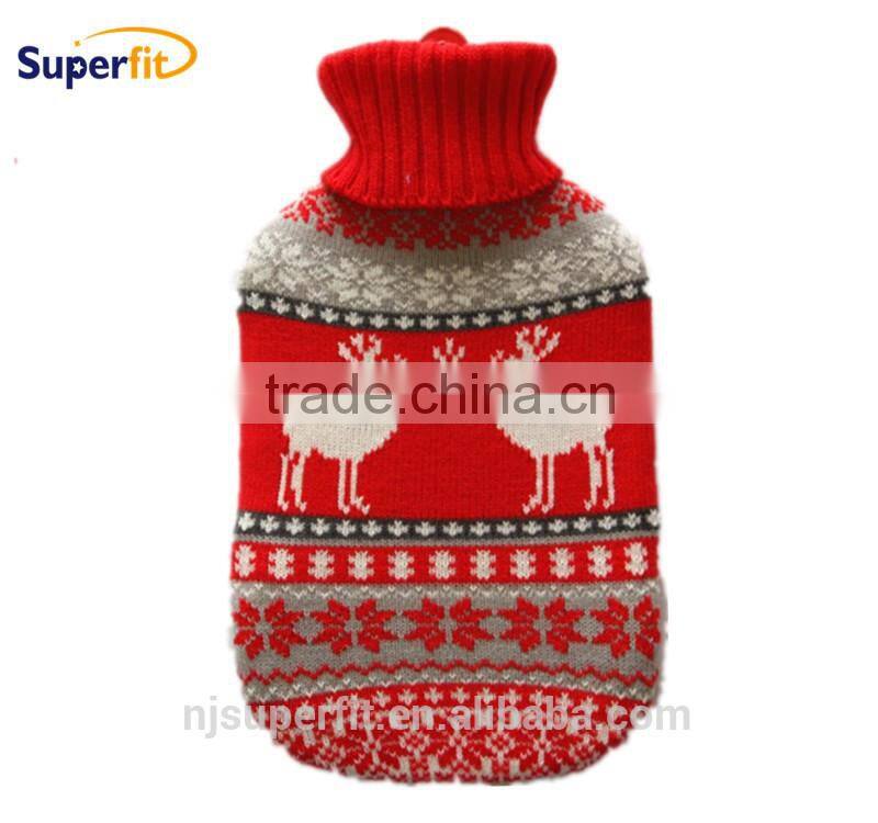 hot water bottle with black white knitted cover