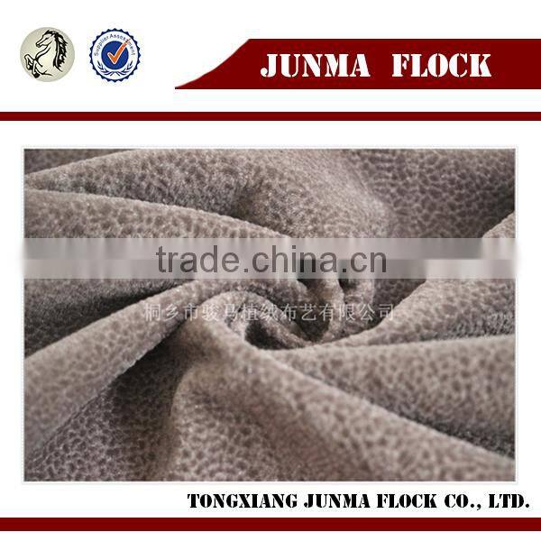 Light brown leopard pattern flocked african plain george fabrics