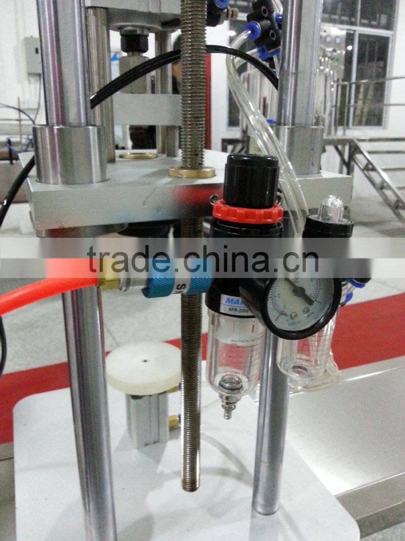 2015 Pneumatic perfume crimping machine bottle capping machine