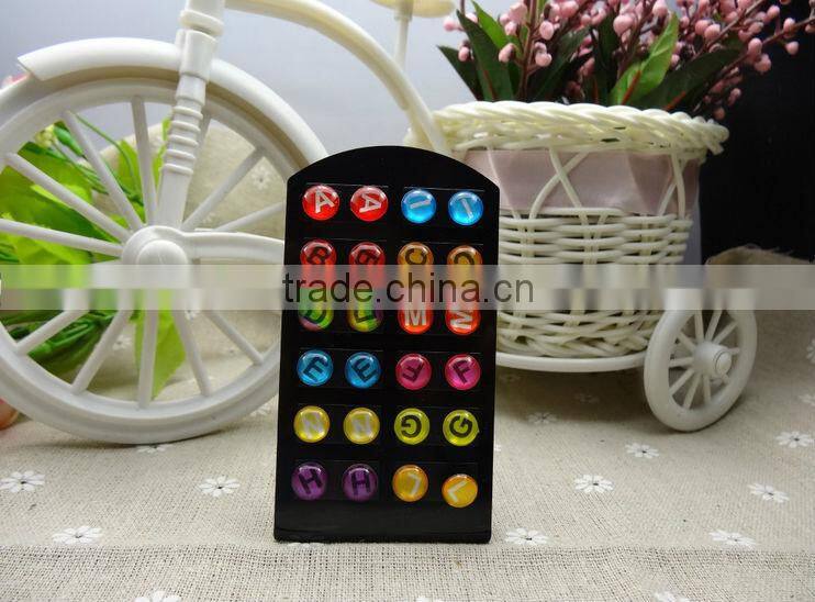 Oil drops adhesive letters stud earrings