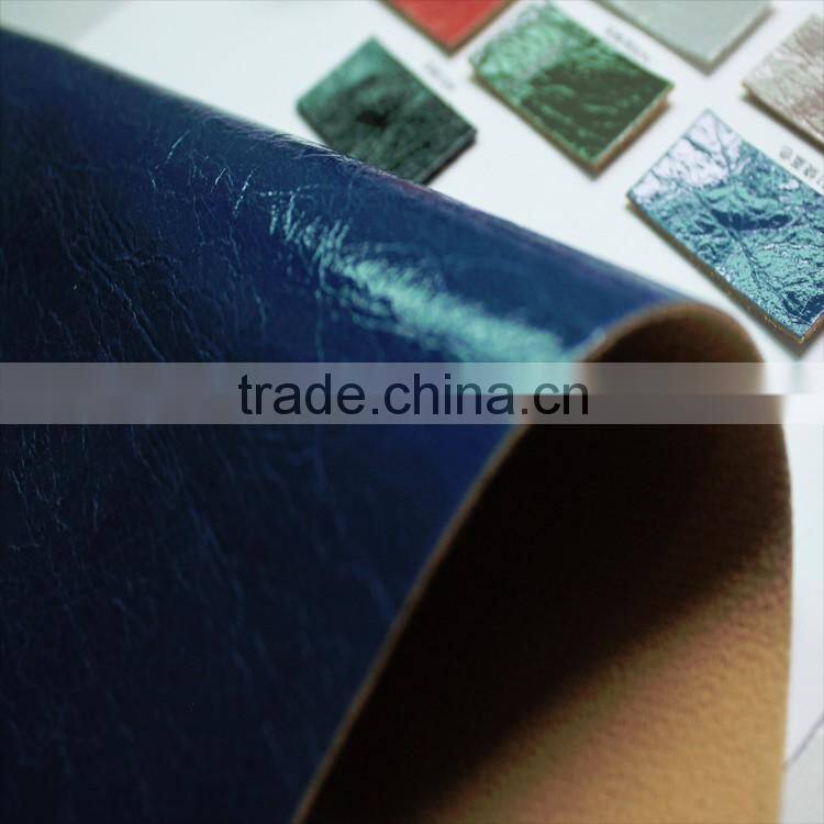 PU faux leather with scratch patterns ans shiny surface