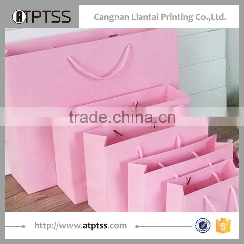 New reusable Gift paper bag with brown twisted handle with customized sizes and designs and colors