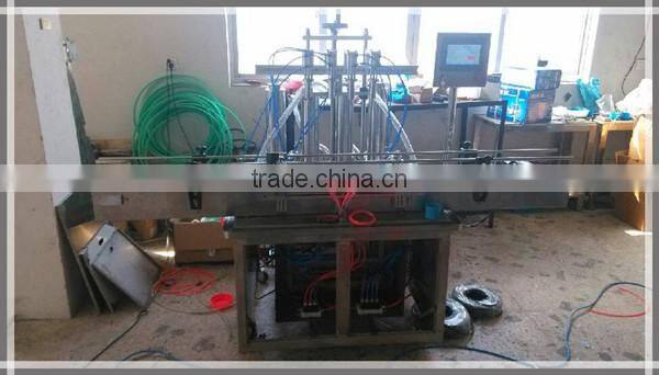 Four Heads Fully Automatic Toiletry Perfume Bottle Filling Machine