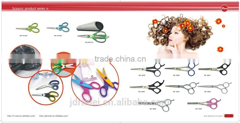 red hand tool engraved scissors