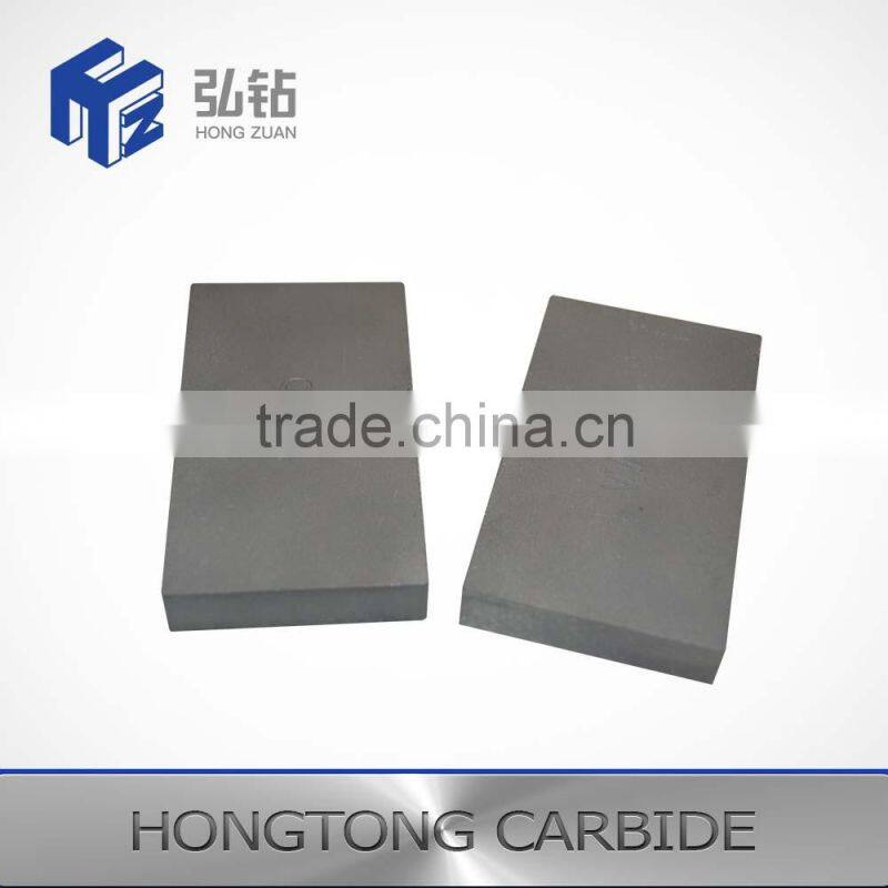 Metal cutting tool of cemented carbide board plate